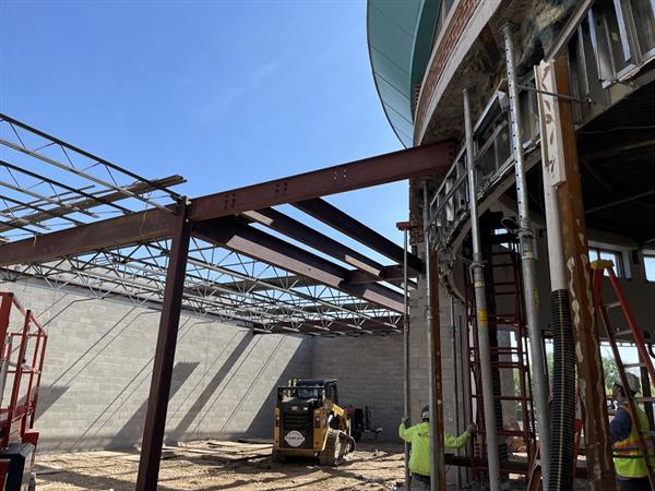 Steel roof framing of kitchen addition
